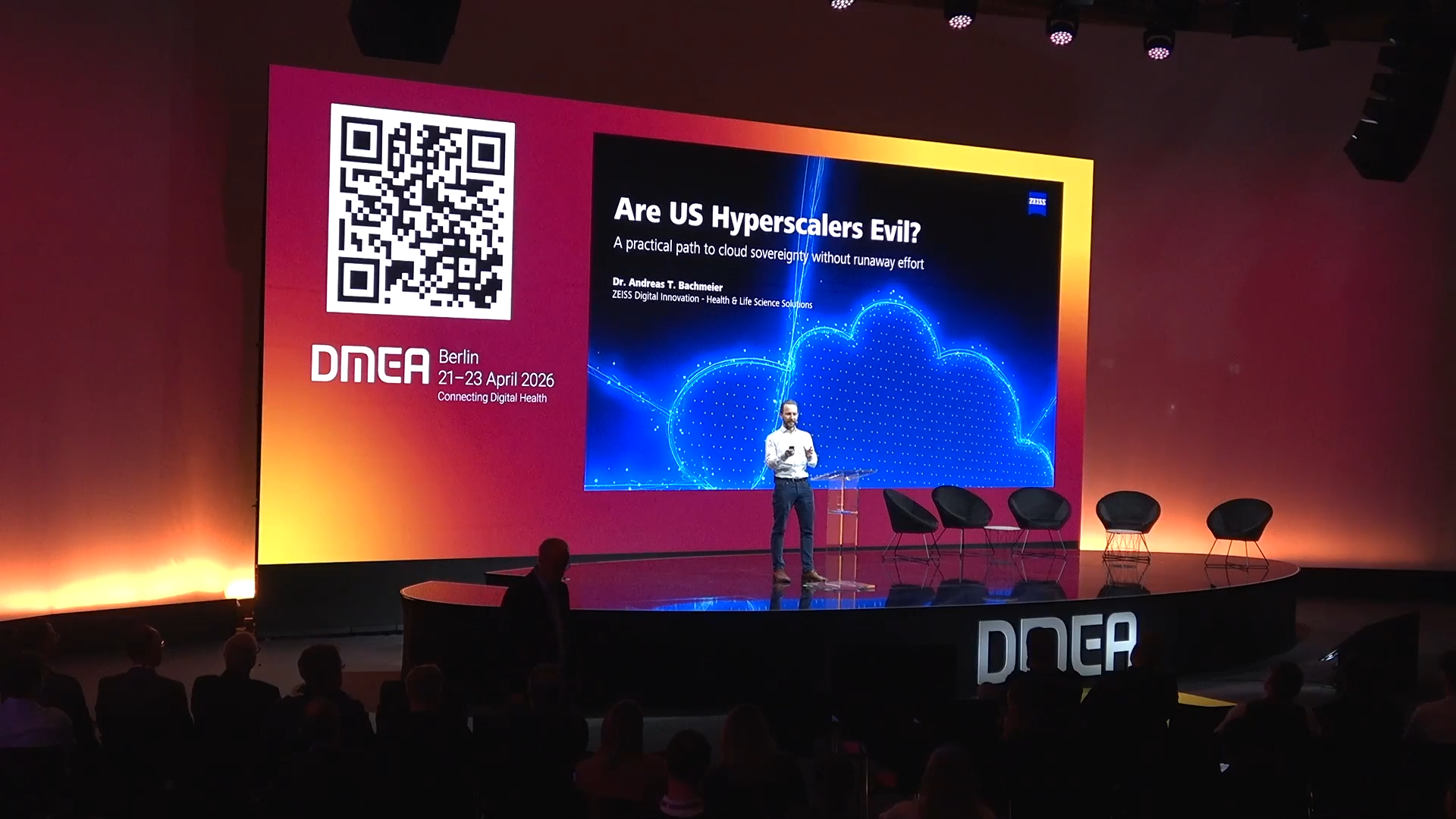 Andreas T. Bachmeier speaking at DMEA26